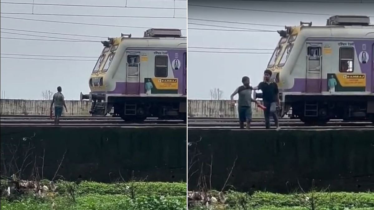 High-Voltage Drama On Railway Tracks: Man Tries To Stop Local Train, Motorman's Quick Action Averts Major Tragedy | Video