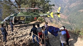 Nepal floods overwhelm morgues as bodies wash up far downstream and identification continues