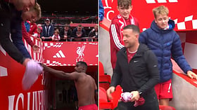 Adult snatches Alexander Isak shirt from child at Anfield; stewards intervene
