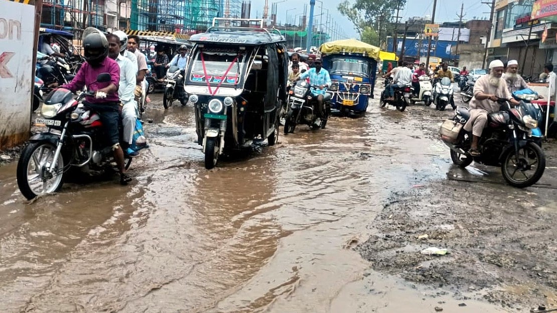 Bhopal’s Rain-Battered Roads Turn Risky; Bikers Fall, Cars Get Stuck In Water-Filled Potholes