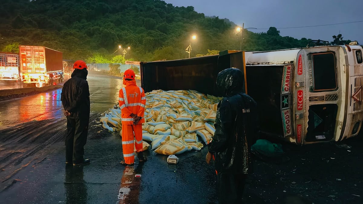 Sand-Laden Dumper Overturns Near Thane's Gaimukh Ghat After Hitting Car, No Injuries