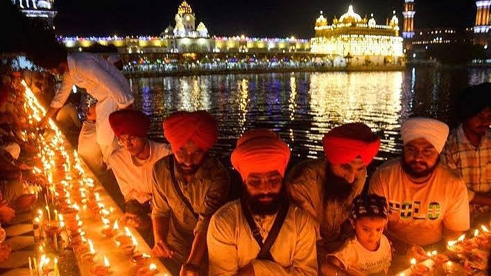 Amritsar’s Golden Temple Illuminated To Mark Guru Granth Sahib Anniversary