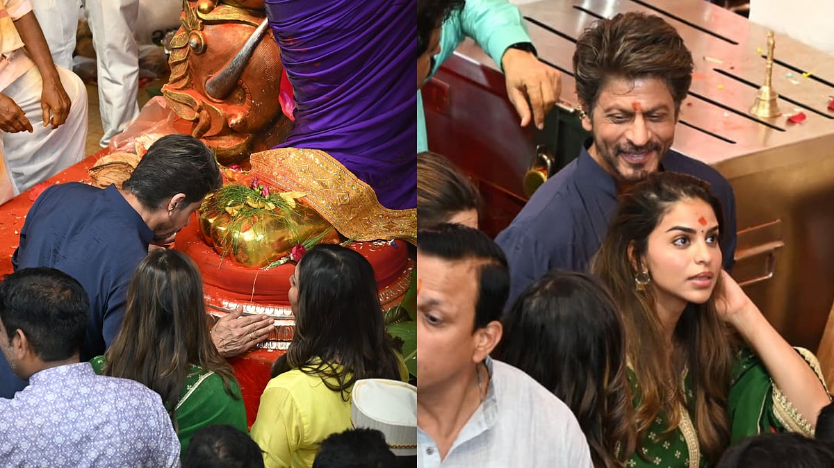 Shah Rukh Khan Performs Aarti At Lalbaugcha Raja With Gauri Khan And Suhana Khan; Protects Them Amid Crowd - VIDEO