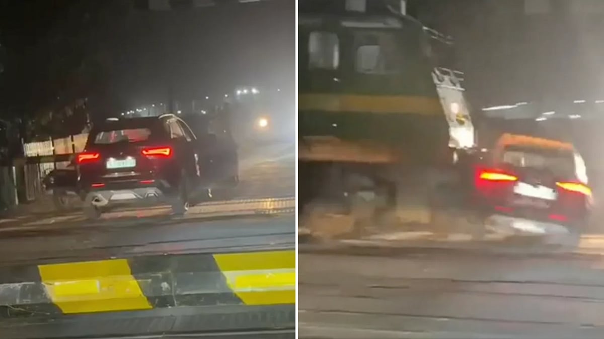 Train Drags Car For 50 Metres At Railway Crossing In Ratlam After Drunk Gatekeeper Closes Barrier In Mid | VIDEO