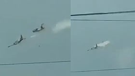 Four pilots killed after two Philippine Air Force SF-260 trainer planes collide during training