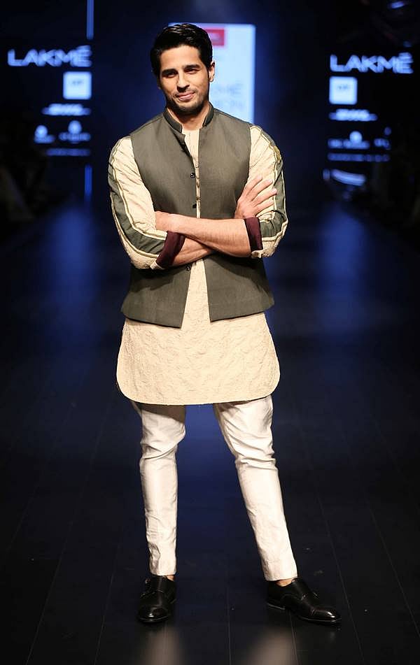 Actor Siddharth Malhotra walks the ramp for Kunal Rawal at LFW SR 2016
