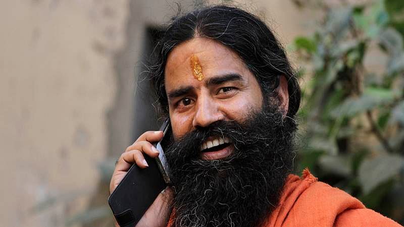 Owner of Patanjali, Baba Ramdev in preliminary talks to buy NDTV