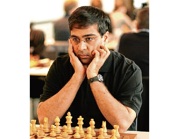 Anand crushes Caruana to join Anish Giri in lead