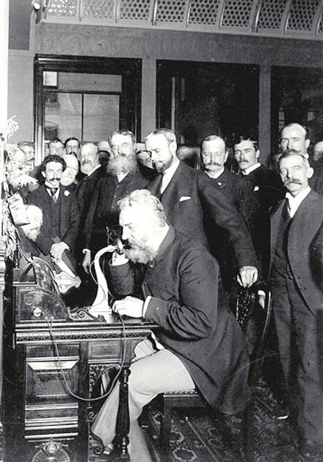 Bell with his telephone