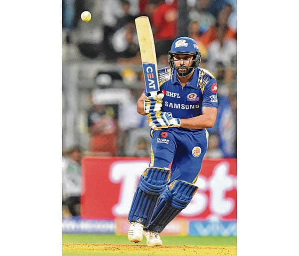 Sharma shows the way as Mumbai Indians win at last