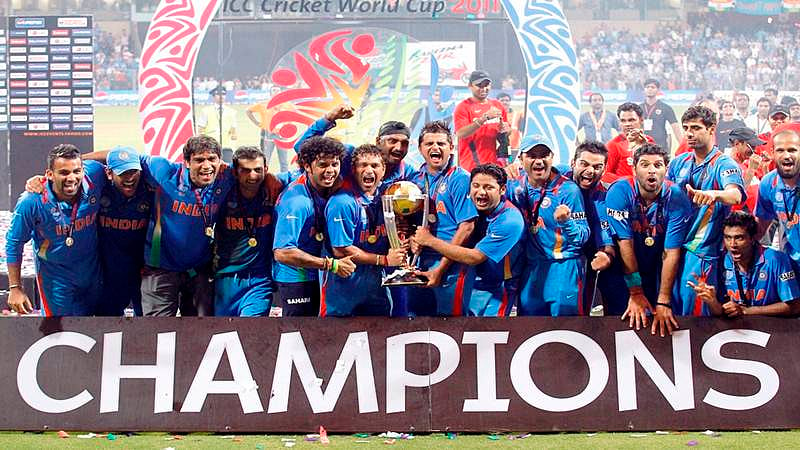 Indian team with the World Cup trophy in 2011 | File Photo