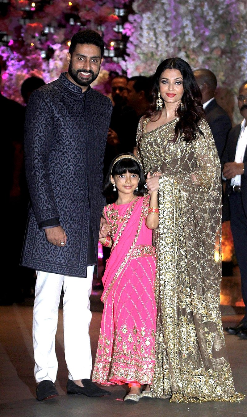Mumbai: Bollywood actors Abhishek Bachchan and Aishwarya Rai Bachchan with daughter Aaradhya pose for a photo at the pre-engagement party of Akash Ambani and fiancee Shloka Mehta, in Mumbai on Saturday, June 30, 2018. (PTI Photo) (PTI7_1_2018_000082B)
