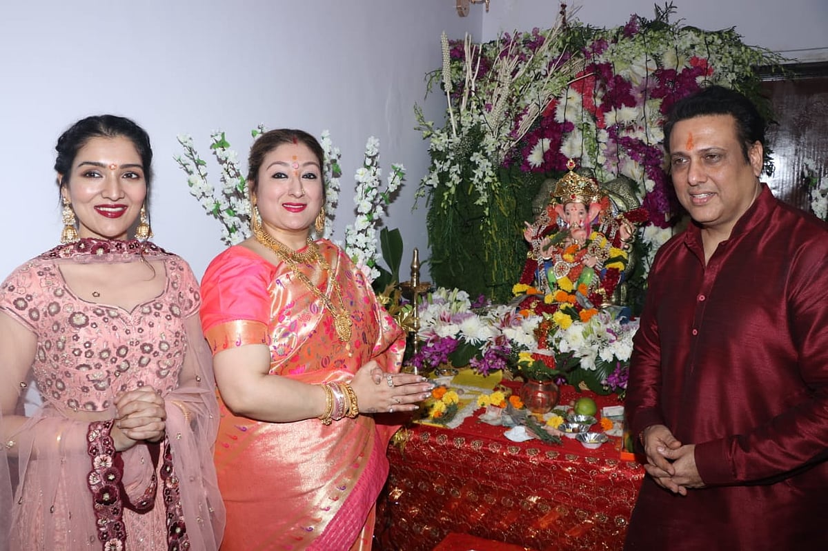 On the occasion of Ganesh Chaturthi Govinda performs puja with wife and daughter. Photo by Viral Bhayani.