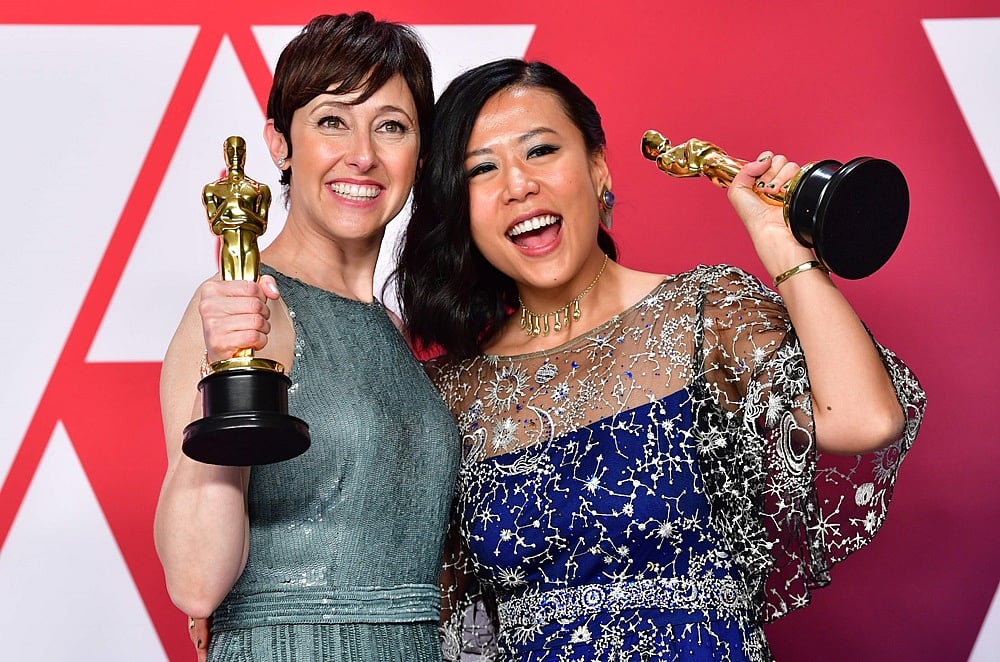 Domee Shi (R) and Becky Neiman-Cobb<br />Photo by FREDERIC J. BROWN / AFP