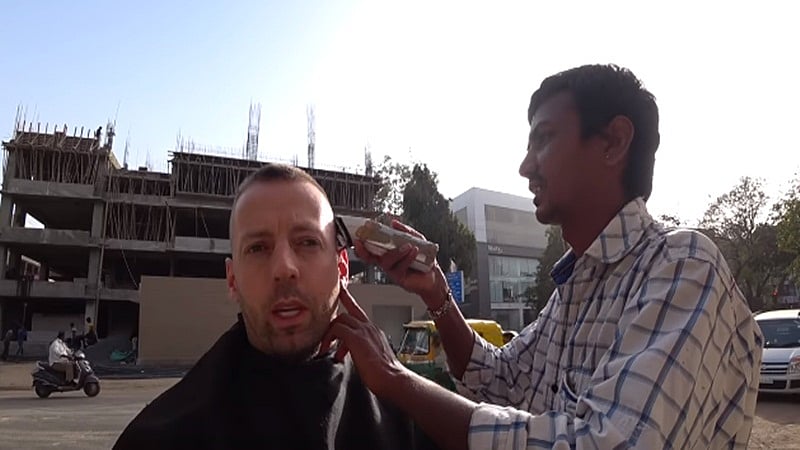 The Royal Haircut! YouTuber pays Rs 30,000 for Rs 20 haircut to roadside barber in India, watch video