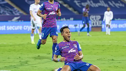 Udanata Singh celebrates after scoring his first goal against the Marina Machans.