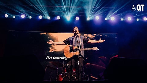 Fr Rob Galea entertains with worship music.