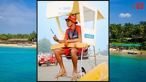 A Drishti Marine lifesaver keeps a close watch at beachgoers. 