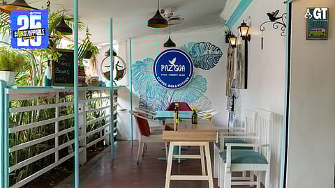 Exterior seating area at Paz Goa cafe in Vagator. 