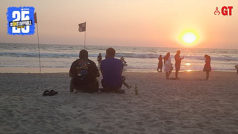 Tourists relax on a beach in Goa.