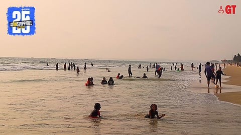 Locals beat the summer heat on the beach.