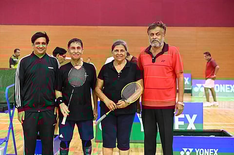 Satish Kudchadkar and Sikletika Ribello win the mixed doubles 