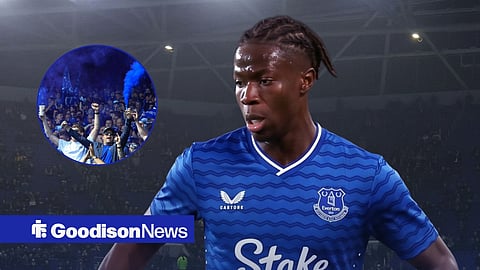 Alieu Njie in an Everton shirt and Toffees fans celebrating.