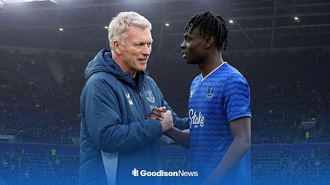 David Moyes and Tyrique George shake hands, with Hill Dickinson Stadium behind them