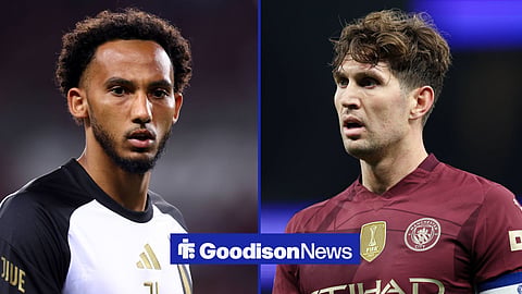 Lloyd Kelly in action for Juventus on the left with  John Stones for Manchester City on the right
