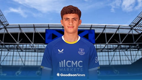 Elijah Upson in an Everton shirt, outside of Hill Dickinson Stadium.