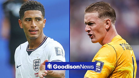 Jordan Pickford looking annoyed towards Jude Bellingham looking annoyed