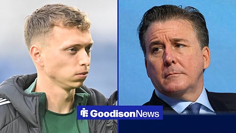 Alistair Johnston warming up for Celtic and Dan Friedkin looking annoyed
