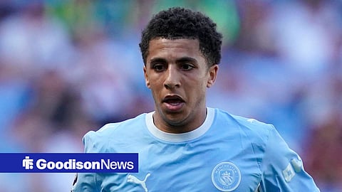 Rico Lewis in action for Manchester City