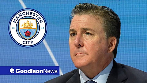 Dan Friedkin looking on and Manchester City badge in circular inset