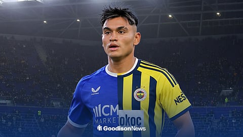 Charly Alcaraz in a half Everton, half Fenerbahce shirt
