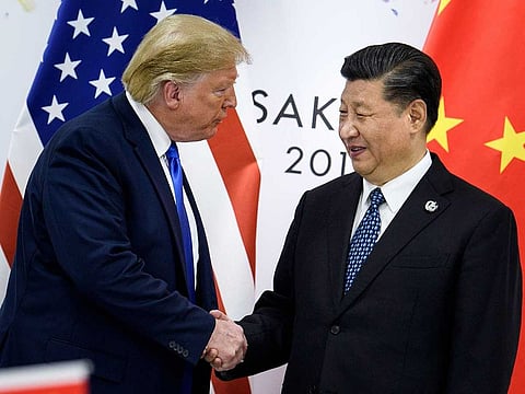 File photo shows US President Donald Trump and China's Xi Jinping -- seen here in June 2019.