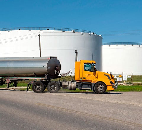 A truck drives past an oil storage facility next to the Phillip 66 oil refinery in Houston, Texas. File photo taken on April 21, 2020. 