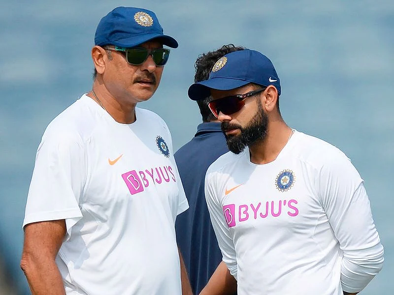 Virat Kohli (R) and coach Ravi Shastri