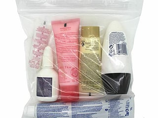 Passengers pass through upgraded security scanners at Heathrow Airport, where the 100ml liquid limit for hand luggage has now been scrapped on departing flights, following the rollout of new CT screening technology. 