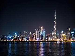Night view of Dubai skyline from Dubai Creek Harbour