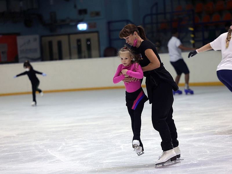 Young ice-skater Lyudmila Zykova at Al Nasr Leisureland rink, under the guidance of coach Svetlana Volkova