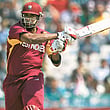 West Indies’ batsman Kieron Pollard hits a shot on his way to
his career-best knock during West Indies’ match with Ireland
in Mohali on Friday.