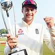 England captain Joe Root poses with the winner's trophy after defeating Sri Lanka by 42 runs. 
