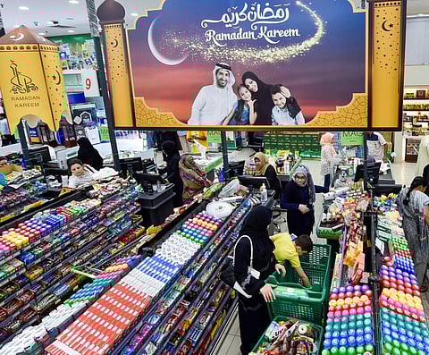 People buy grocery at Sharjah Cooperative Society in Halwan area in Sharjah, for the month of Ramadan.