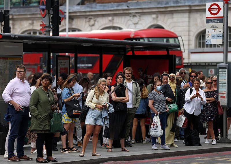 Passengers queue for buses outside Victoria Station London. (Picture used for illustrative purposes)