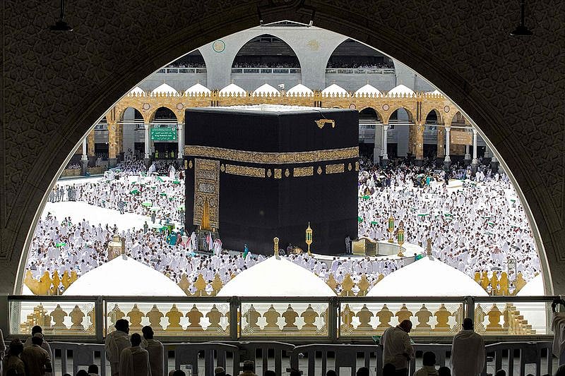 Muslim worshippers pray around the Kaaba, Islam's holiest shrine, at the Grand Mosque. 