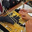Gold costs have been coming under more pressure these past weeks, with the global spot price staying below $2,000 (Dh7,345) per ounce.