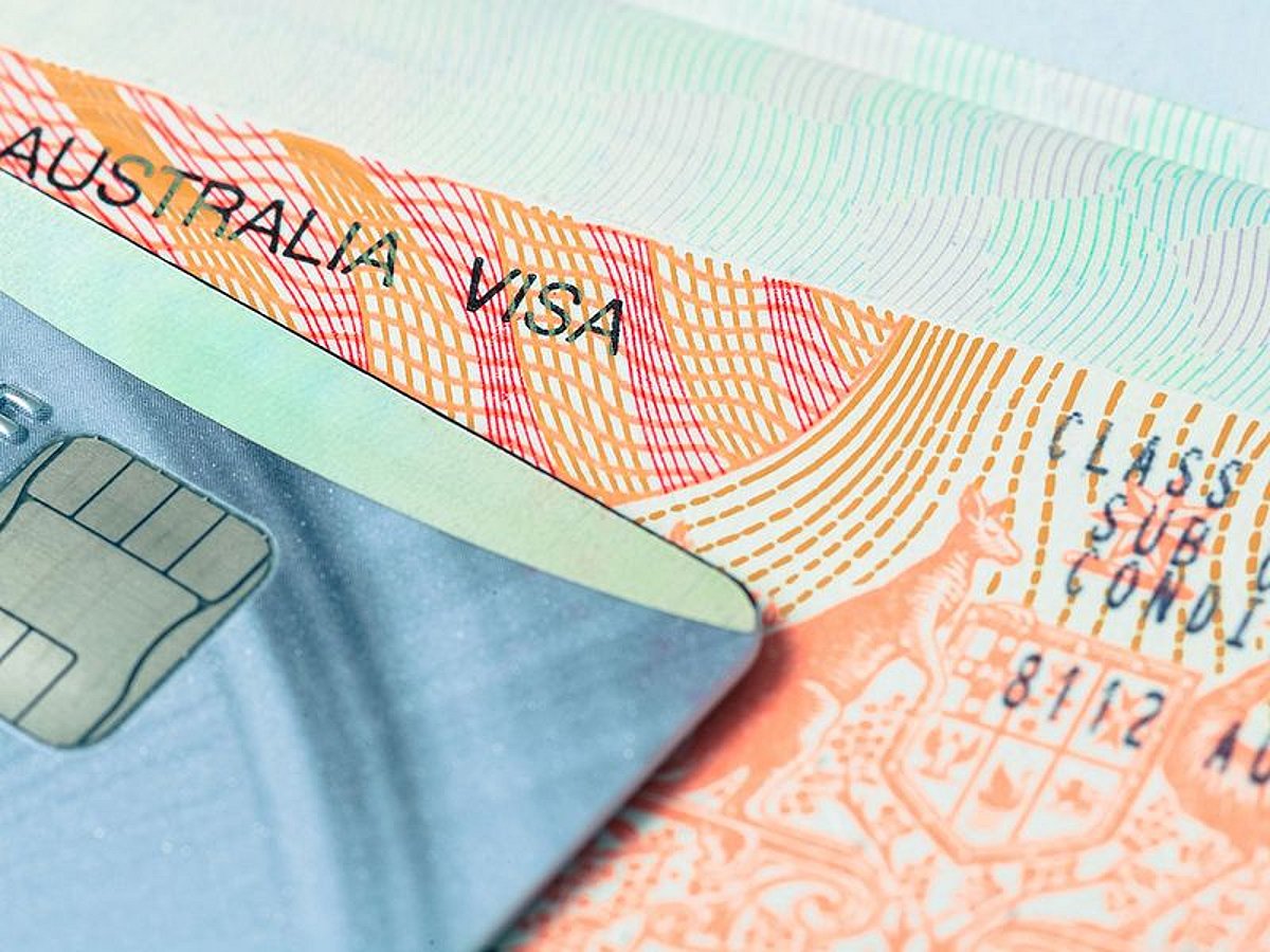 Photo: gulfnews.com Passport stamp visa and credit card for travel concept background, Australia