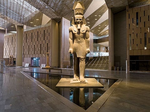 The Hanging Obelisk greets visitors before entry to the Grand Hall of the new $1 billion Grand Egyptian Museum near the Pyramids of Giza.