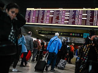 Airlines in Europe are trying to avoid a repeat of last summer's travel chaos, when strikes and staff shortages were so bad that London's Heathrow Airport capped passenger numbers and asked airlines to limit ticket sales. Travelers are going to jam European airports once again in July and August, with passenger numbers returning to or exceeding pre-pandemic levels. (Photo: Passengers at Lisbon airport)